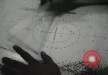 Standbild Offiziere auf Japanischen Uboot plot Position und Navigieren Indischer Ozean, 1942, aus Sekunde 52 historischem Filmmaterial Videoclip 65675022283