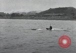 Standbild japanischen U-Boot und Schnellboot Yokosuka Yokosuka Japan Hafen, 1940, aus Sekunde 37 historischem Filmmaterial Videoclip 65675022296