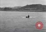 Standbild japanischen U-Boot und Schnellboot Yokosuka Yokosuka Japan Hafen, 1940, aus Sekunde 41 historischem Filmmaterial Videoclip 65675022296