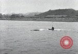 Standbild japanischen U-Boot und Schnellboot Yokosuka Yokosuka Japan Hafen, 1940, aus Sekunde 42 historischem Filmmaterial Videoclip 65675022296