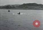 Standbild japanischen U-Boot und Schnellboot Yokosuka Yokosuka Japan Hafen, 1940, aus Sekunde 44 historischem Filmmaterial Videoclip 65675022296