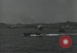 Standbild Schnellboot schleppt Prallluftschiffe Yokosuka Yokosuka Japan Hafen, 1940, aus Sekunde 3 historischem Filmmaterial Videoclip 65675022297