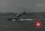 Standbild Schnellboot schleppt Prallluftschiffe Yokosuka Yokosuka Japan Hafen, 1940, aus Sekunde 5 historischem Filmmaterial Videoclip 65675022297