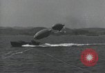Standbild Schnellboot schleppt Prallluftschiffe Yokosuka Yokosuka Japan Hafen, 1940, aus Sekunde 6 historischem Filmmaterial Videoclip 65675022297