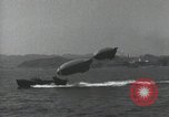 Standbild Schnellboot schleppt Prallluftschiffe Yokosuka Yokosuka Japan Hafen, 1940, aus Sekunde 7 historischem Filmmaterial Videoclip 65675022297