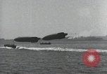 Standbild Schnellboot schleppt Prallluftschiffe Yokosuka Yokosuka Japan Hafen, 1940, aus Sekunde 23 historischem Filmmaterial Videoclip 65675022297