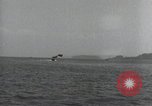 Standbild Schnellboot schleppt Prallluftschiffe Yokosuka Yokosuka Japan Hafen, 1940, aus Sekunde 26 historischem Filmmaterial Videoclip 65675022297