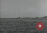 Standbild Schnellboot schleppt Prallluftschiffe Yokosuka Yokosuka Japan Hafen, 1940, aus Sekunde 28 historischem Filmmaterial Videoclip 65675022297