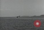Standbild Schnellboot schleppt Prallluftschiffe Yokosuka Yokosuka Japan Hafen, 1940, aus Sekunde 30 historischem Filmmaterial Videoclip 65675022297