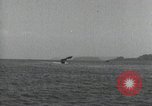 Standbild Schnellboot schleppt Prallluftschiffe Yokosuka Yokosuka Japan Hafen, 1940, aus Sekunde 32 historischem Filmmaterial Videoclip 65675022297