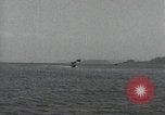 Standbild Schnellboot schleppt Prallluftschiffe Yokosuka Yokosuka Japan Hafen, 1940, aus Sekunde 34 historischem Filmmaterial Videoclip 65675022297