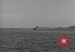 Standbild Schnellboot schleppt Prallluftschiffe Yokosuka Yokosuka Japan Hafen, 1940, aus Sekunde 35 historischem Filmmaterial Videoclip 65675022297