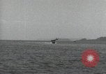 Standbild Schnellboot schleppt Prallluftschiffe Yokosuka Yokosuka Japan Hafen, 1940, aus Sekunde 37 historischem Filmmaterial Videoclip 65675022297