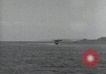 Standbild Schnellboot schleppt Prallluftschiffe Yokosuka Yokosuka Japan Hafen, 1940, aus Sekunde 38 historischem Filmmaterial Videoclip 65675022297