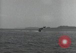 Standbild Schnellboot schleppt Prallluftschiffe Yokosuka Yokosuka Japan Hafen, 1940, aus Sekunde 45 historischem Filmmaterial Videoclip 65675022297