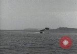 Standbild Schnellboot schleppt Prallluftschiffe Yokosuka Yokosuka Japan Hafen, 1940, aus Sekunde 47 historischem Filmmaterial Videoclip 65675022297
