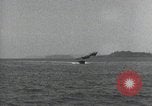 Standbild Schnellboot schleppt Prallluftschiffe Yokosuka Yokosuka Japan Hafen, 1940, aus Sekunde 48 historischem Filmmaterial Videoclip 65675022297