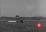Standbild Schnellboot schleppt Prallluftschiffe Yokosuka Yokosuka Japan Hafen, 1940, aus Sekunde 50 historischem Filmmaterial Videoclip 65675022297
