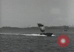 Standbild Schnellboot schleppt Prallluftschiffe Yokosuka Yokosuka Japan Hafen, 1940, aus Sekunde 52 historischem Filmmaterial Videoclip 65675022297