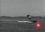 Standbild Schnellboot schleppt Prallluftschiffe Yokosuka Yokosuka Japan Hafen, 1940, aus Sekunde 53 historischem Filmmaterial Videoclip 65675022297