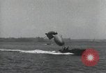 Standbild Schnellboot schleppt Prallluftschiffe Yokosuka Yokosuka Japan Hafen, 1940, aus Sekunde 56 historischem Filmmaterial Videoclip 65675022297