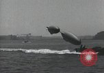 Standbild Schnellboot schleppt Prallluftschiffe Yokosuka Yokosuka Japan Hafen, 1940, aus Sekunde 58 historischem Filmmaterial Videoclip 65675022297