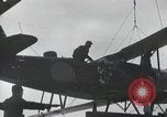 Standbild Doppeldecker auf japanischen Schiff Japan, 1940, aus Sekunde 18 historischem Filmmaterial Videoclip 65675022298