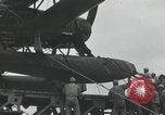 Standbild Doppeldecker auf japanischen Schiff Japan, 1940, aus Sekunde 24 historischem Filmmaterial Videoclip 65675022298