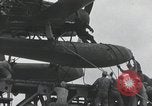 Standbild Doppeldecker auf japanischen Schiff Japan, 1940, aus Sekunde 26 historischem Filmmaterial Videoclip 65675022298