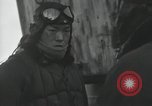 Standbild Doppeldecker auf japanischen Schiff Japan, 1940, aus Sekunde 56 historischem Filmmaterial Videoclip 65675022298