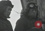 Standbild Doppeldecker auf japanischen Schiff Japan, 1940, aus Sekunde 59 historischem Filmmaterial Videoclip 65675022298