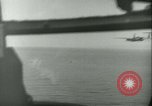 Standbild Bombardierung auf Rabaul Papua Neu Guinea, 1943, aus Sekunde 18 historischem Filmmaterial Videoclip 65675022409