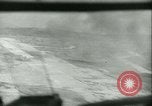 Standbild Bombardierung auf Rabaul Papua Neu Guinea, 1943, aus Sekunde 44 historischem Filmmaterial Videoclip 65675022409