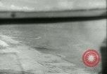 Standbild Bombardierung auf Rabaul Papua Neu Guinea, 1943, aus Sekunde 45 historischem Filmmaterial Videoclip 65675022409