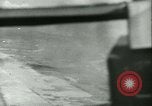Standbild Bombardierung auf Rabaul Papua Neu Guinea, 1943, aus Sekunde 46 historischem Filmmaterial Videoclip 65675022409