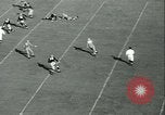 Standbild Notre Dame gegenüber der Carnegie Tech football South Bend Indiana USA, 1936, aus Sekunde 28 historischem Filmmaterial Videoclip 65675022420