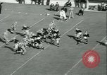 Standbild Notre Dame gegenüber der Carnegie Tech football South Bend Indiana USA, 1936, aus Sekunde 54 historischem Filmmaterial Videoclip 65675022420