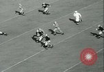 Standbild Notre Dame gegenüber der Carnegie Tech football South Bend Indiana USA, 1936, aus Sekunde 59 historischem Filmmaterial Videoclip 65675022420
