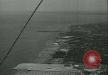 Image of crowded Long Island seashore New York United States USA, 1934, second 4 stock footage video 65675022423