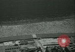 Image of crowded Long Island seashore New York United States USA, 1934, second 12 stock footage video 65675022423