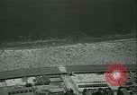 Image of crowded Long Island seashore New York United States USA, 1934, second 13 stock footage video 65675022423
