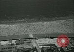 Image of crowded Long Island seashore New York United States USA, 1934, second 14 stock footage video 65675022423