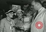 Image of FDIC pays depositors of failed Fon Du Lac Bank East Peoria Illinois USA, 1934, second 17 stock footage video 65675022427