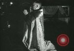 Image of priest performs religious ceremony United States USA, 1934, second 11 stock footage video 65675022430