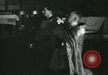 Image of priest performs religious ceremony United States USA, 1934, second 19 stock footage video 65675022430