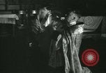 Image of priest performs religious ceremony United States USA, 1934, second 20 stock footage video 65675022430
