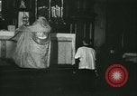 Image of priest performs religious ceremony United States USA, 1934, second 27 stock footage video 65675022430