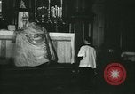 Image of priest performs religious ceremony United States USA, 1934, second 28 stock footage video 65675022430