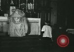 Image of priest performs religious ceremony United States USA, 1934, second 30 stock footage video 65675022430