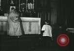 Image of priest performs religious ceremony United States USA, 1934, second 31 stock footage video 65675022430